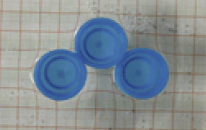 Particles at Liquid Interfaces